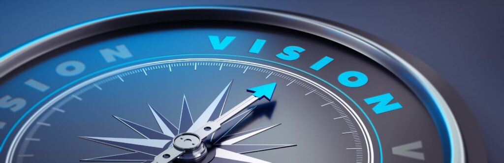 bussola con scritto vision